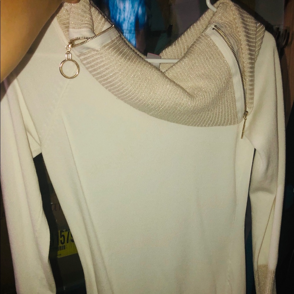 Women’s long sleeved cream dress